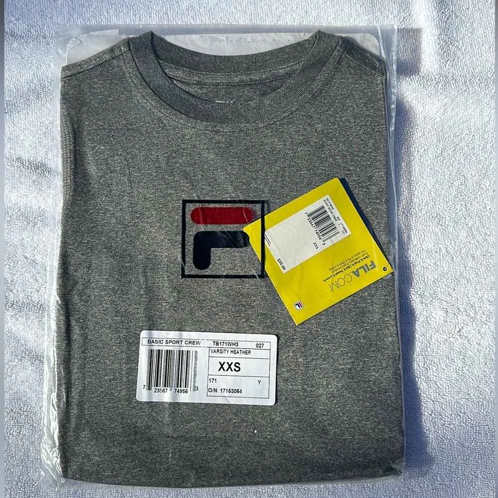 Short sleeve Fila shirt. NWT